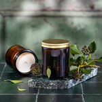 8oz straight-sided amber glass jar with gold lid.